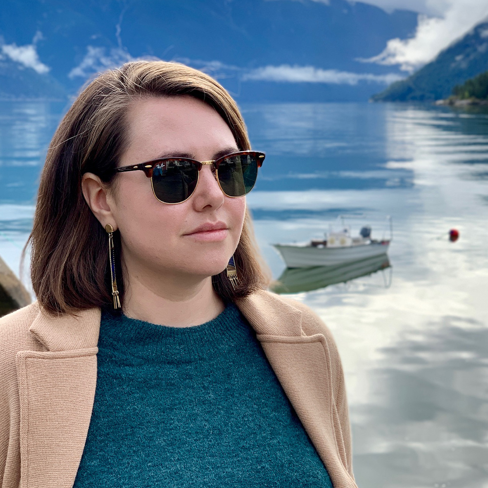 Patricia O'Connor beside a fjord in Norway